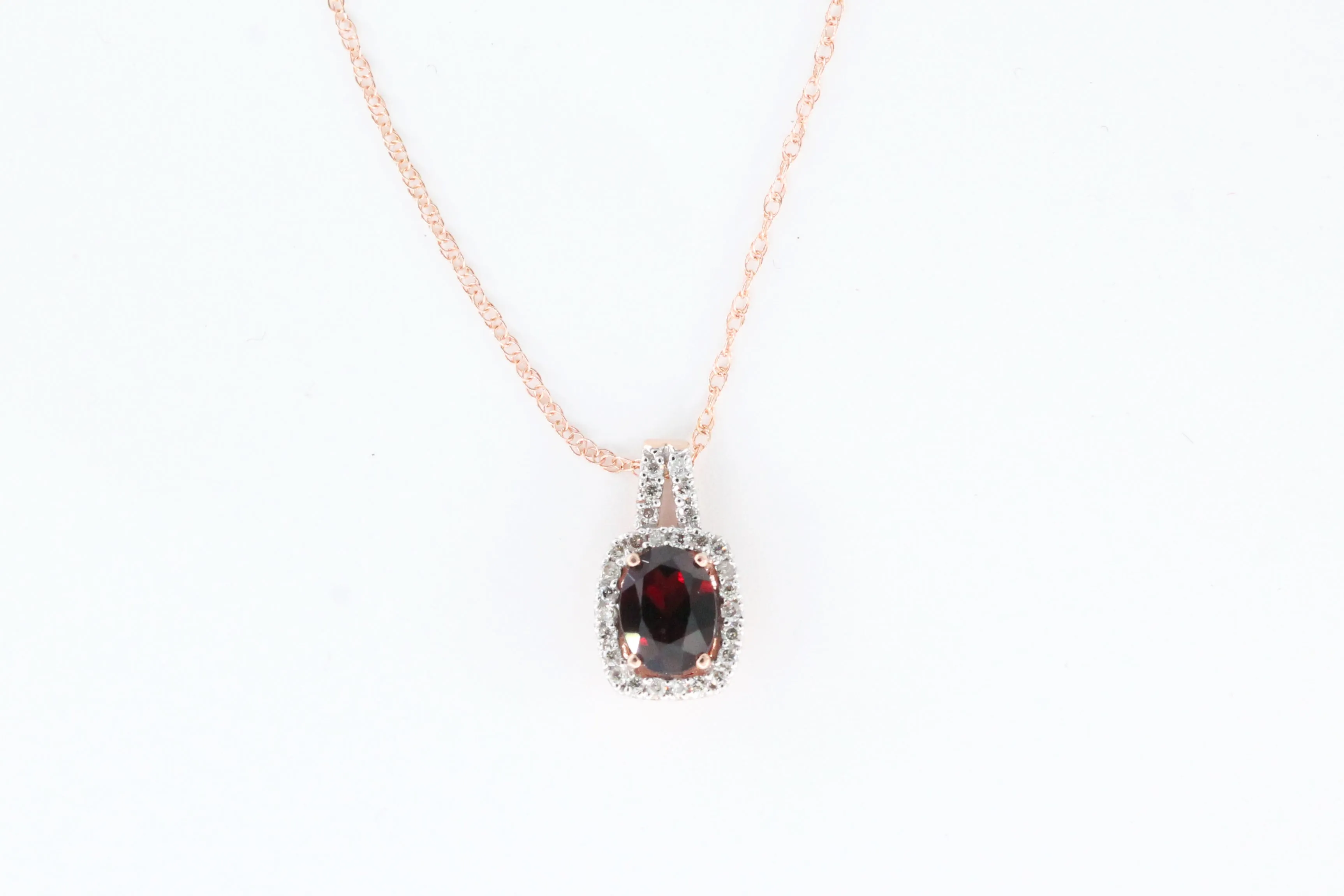 Rose Gold Oval Garnet Halo Pendant with Chain